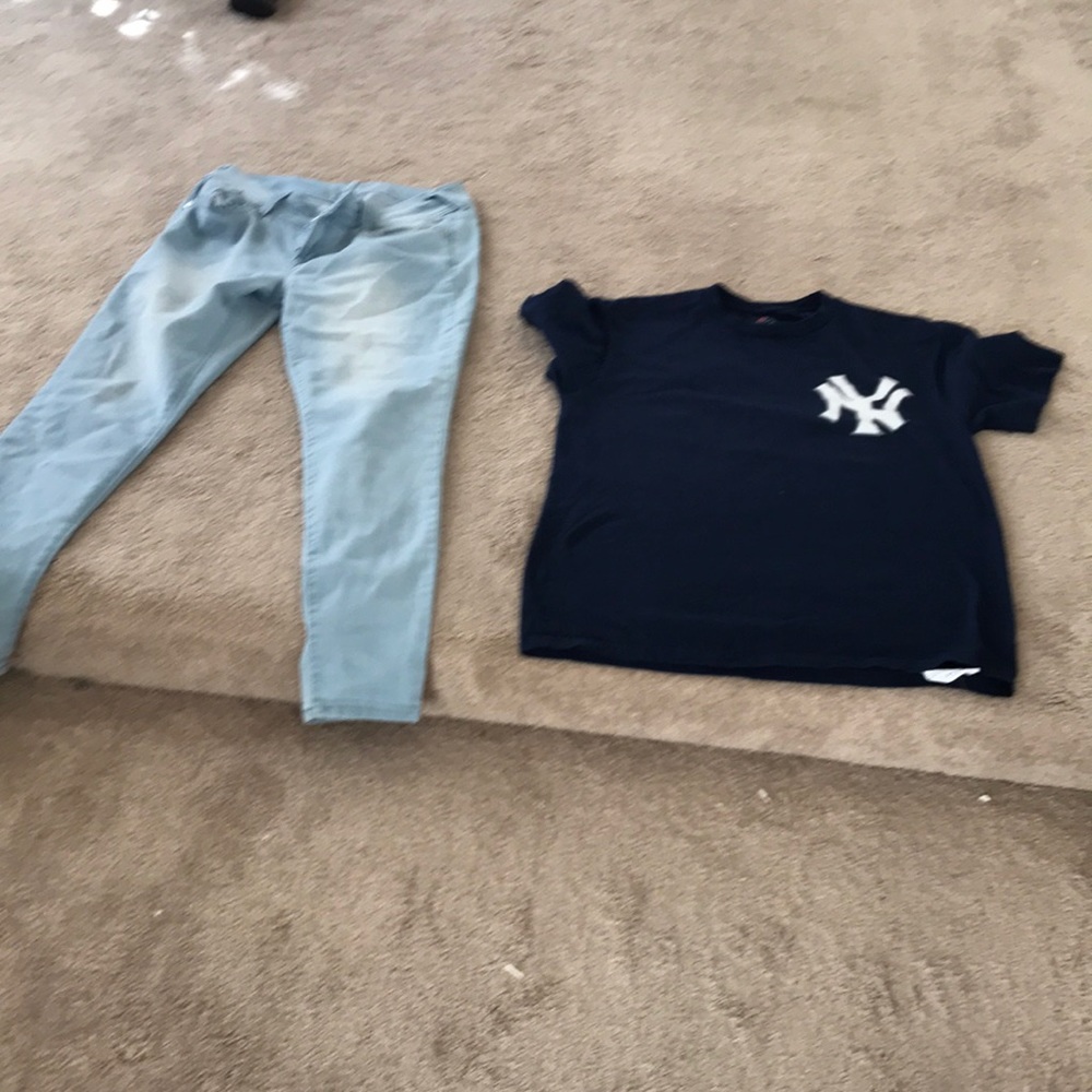 One pair of pants and a yankee T-shirt